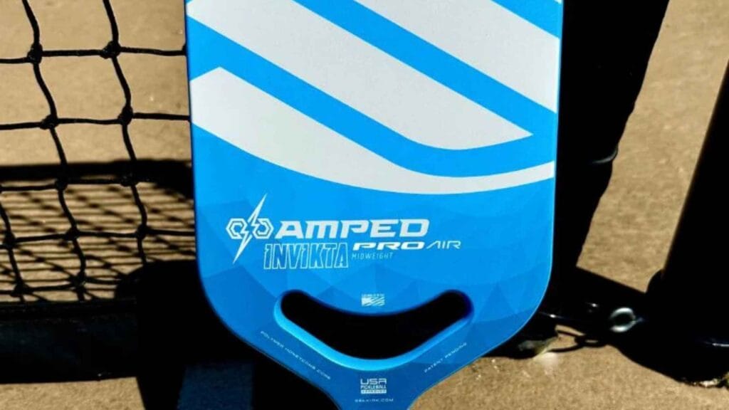 Selkirk Amped Pro Air pickleball paddle, showcasing its blue design and large sweet spot for improved performance.